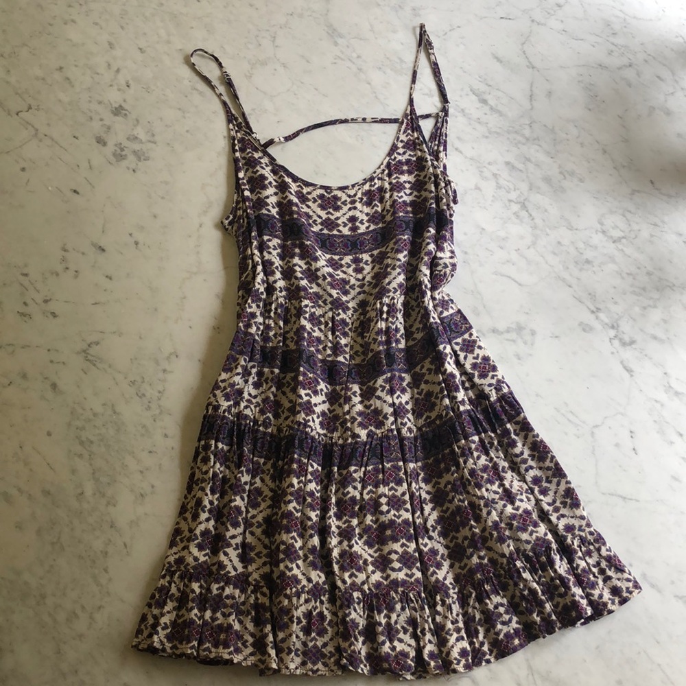 purple and white printed flowy dress